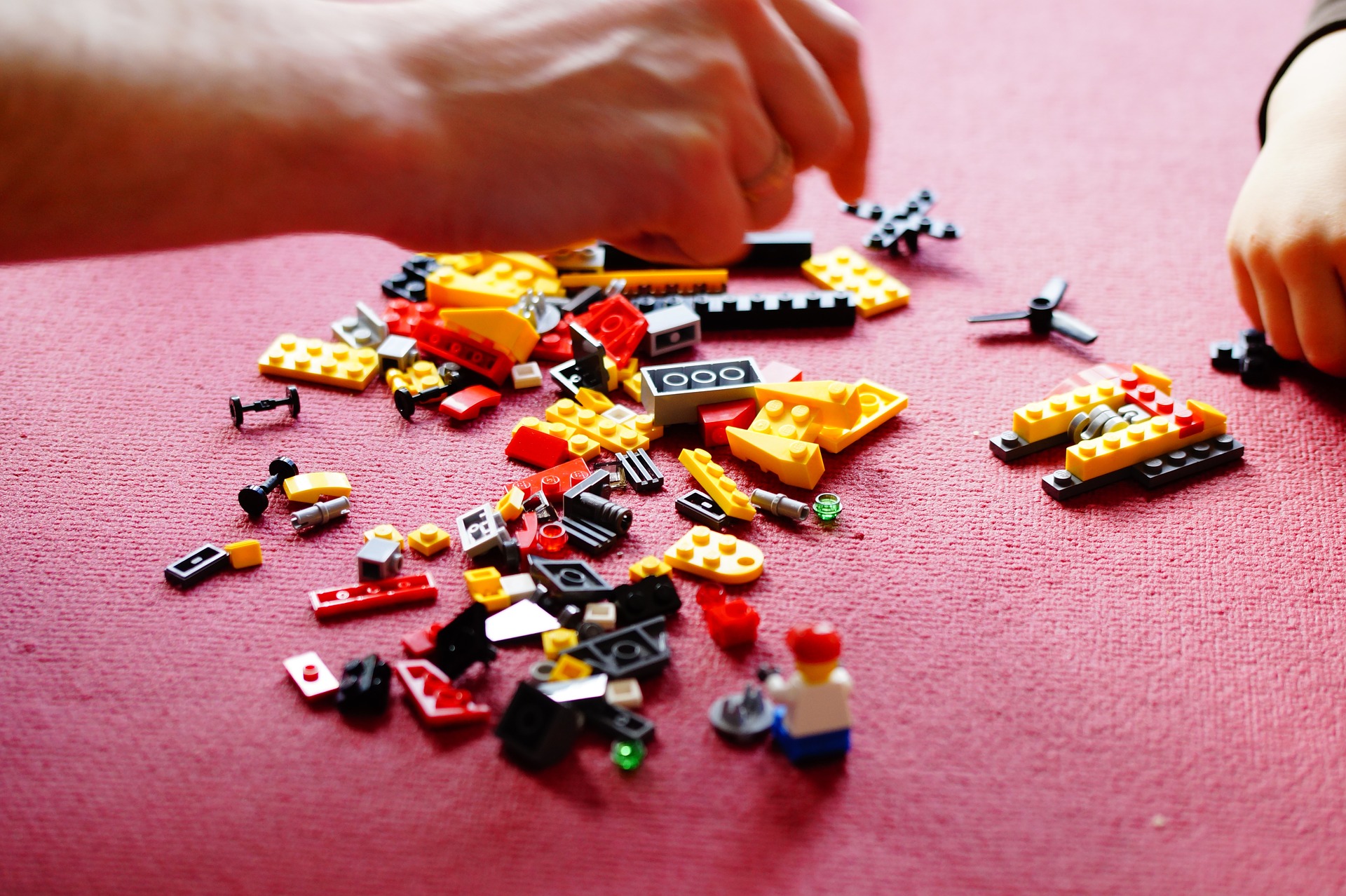 Various lego blocks spread across table