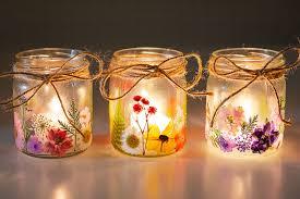 Image of three small pressed flower lanterns.